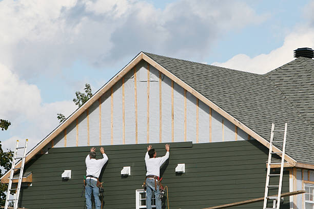 Professional Vinyl Siding technician working in Carlton, PA